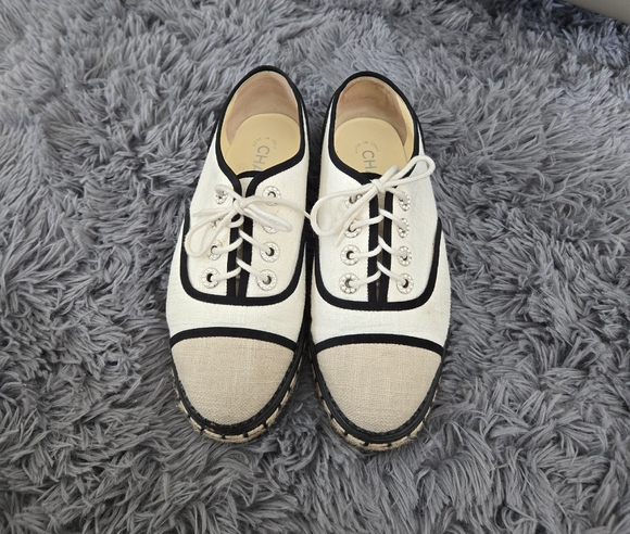 CHANEL Shoes - CHANEL Black and White Sneakers with Timeless Style